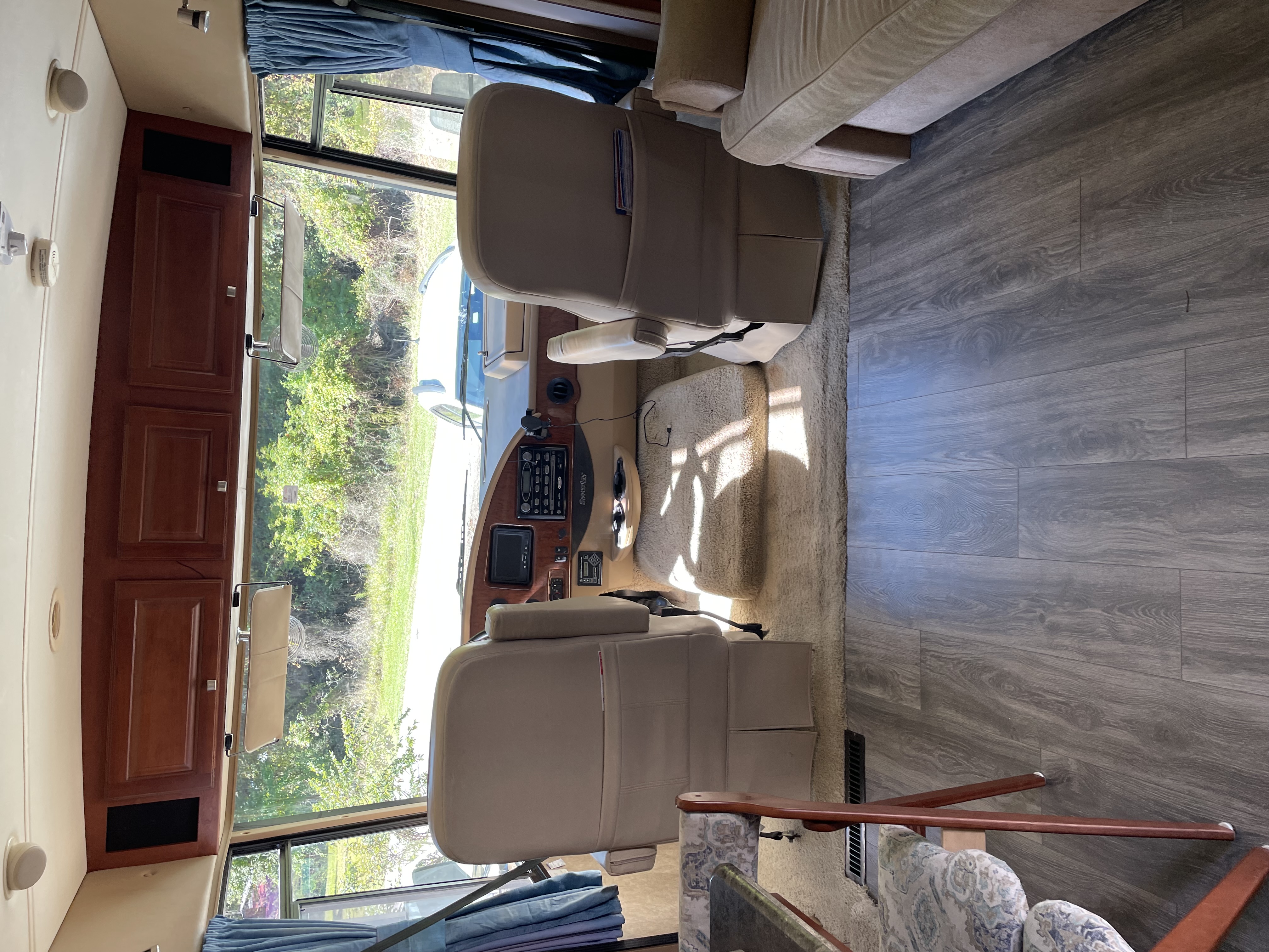 Interior living area of 2013 Winnebago Sunstar 30T